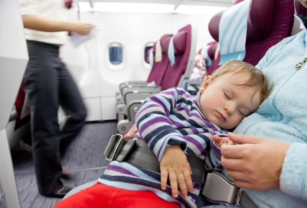 baby-on-plane.jpg 309e0d3ad42a62e2132eec7a3b44b77f